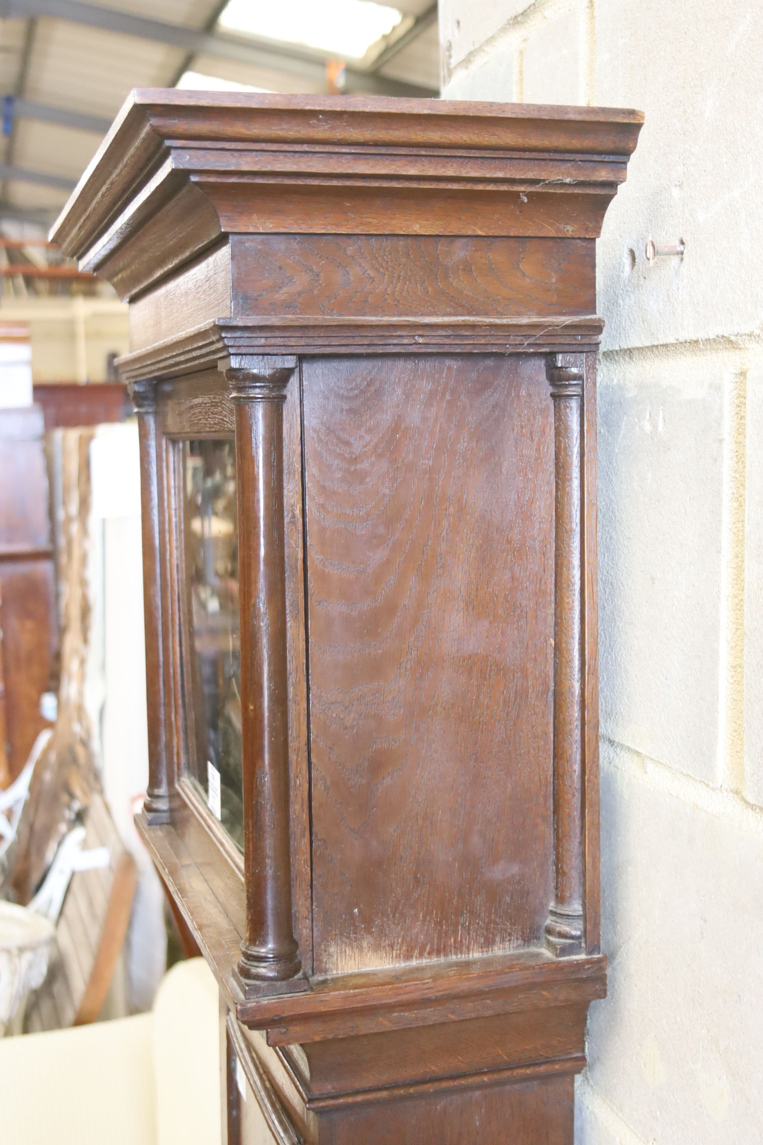 An early 19th century oak eight day longcase clock, marked Cousens Langport, height 194cm